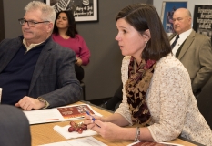 Representative Carolyn Dykema with Rep. David Linsky in background