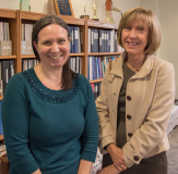 Sadie Simone (ED of MWCIL) and Susan Nicholl (representing Senator Spilka)