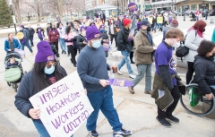 Marchers with signs