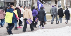 Marchers with signs