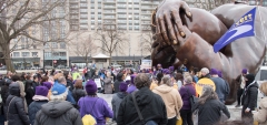 Crowd under the Embrace