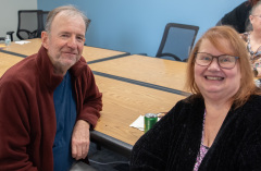 two people smiling