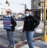 Gann Students with sign pointing to Protest Parking