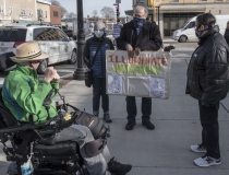 Chris Hoeh, Anne Fracht, Rick Glassman and woman.  Sign: "Illuminate History"