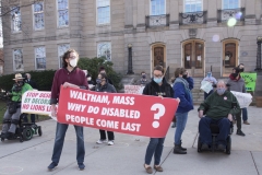 Protestors - large banner "Waltham, Mass. Why do disabled people come last?"
