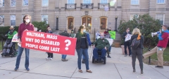 Protestors - large banner "Waltham, Mass. Why do disabled people come last?" , Bill Henning speaking.