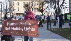 Banner: Human Rights not Holiday Lights