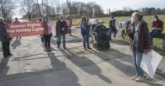 Ruthie Poole speaks to protestors at Fernald