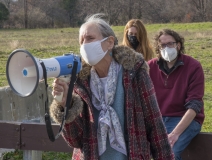 Ruthie Poole speaks to protestors at Fernald