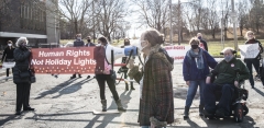 Ruthie Poole speaks to protestors at Fernald