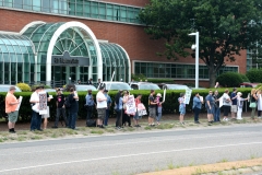 Sign Holders along the street in front of Boston Globe