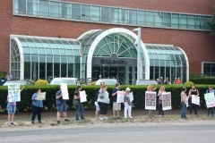 Sign Holders along the street in front of Boston Globe