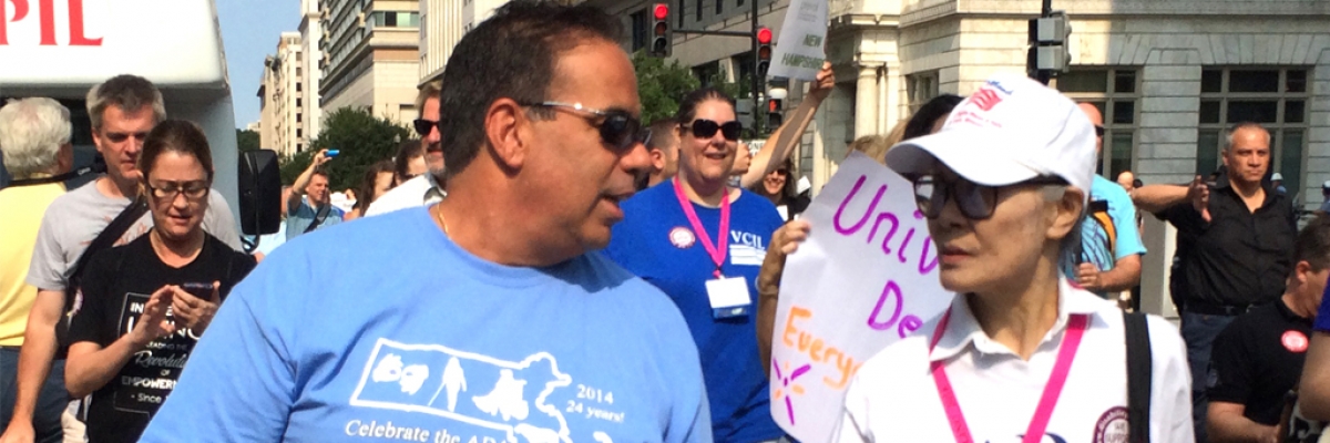 dave and yoshida dart at Washington, D.C. rally, 2014