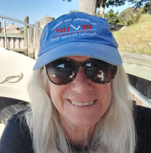 Sue Rorke wearing a REV UP MA cap