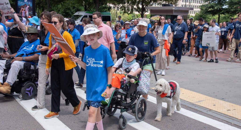 marchers, children , dog, wheelchairs