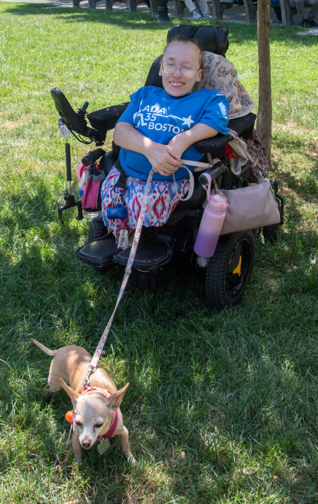 woman in wheelchair with her dog