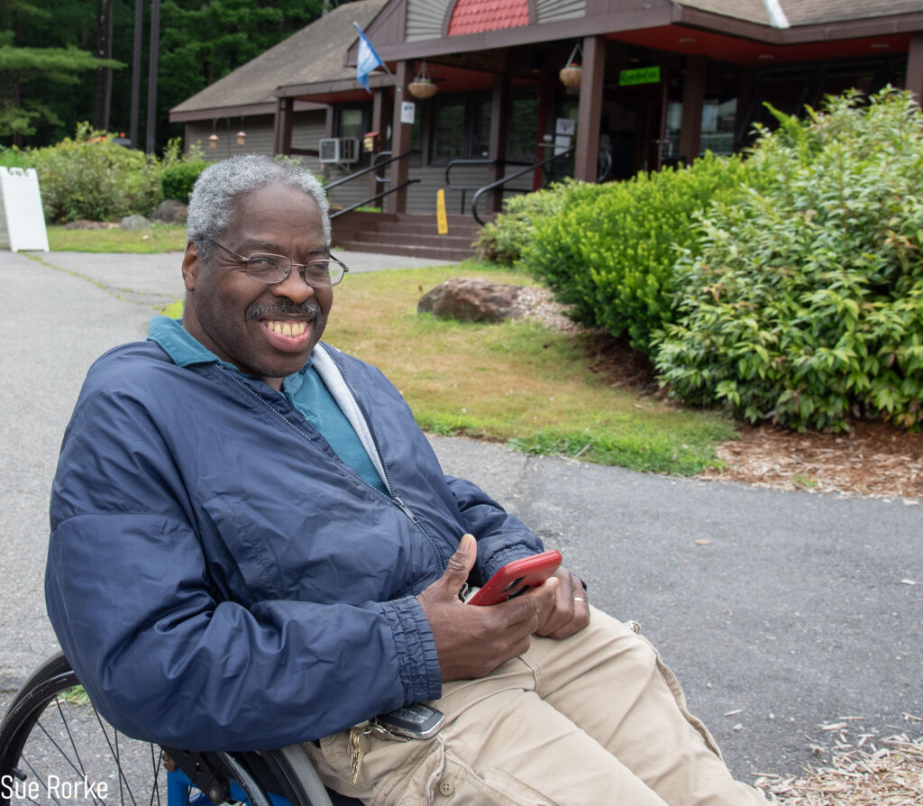 man in front of park headquarters