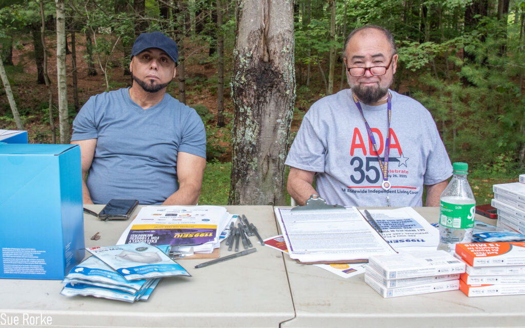 1199SEIU table with two men