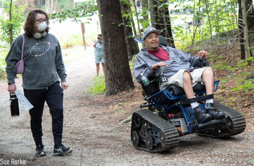 Man in all terrain chair with friend