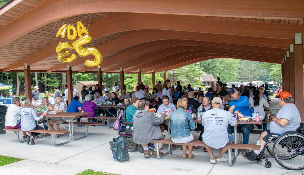 View of pavilion as people eat lunch