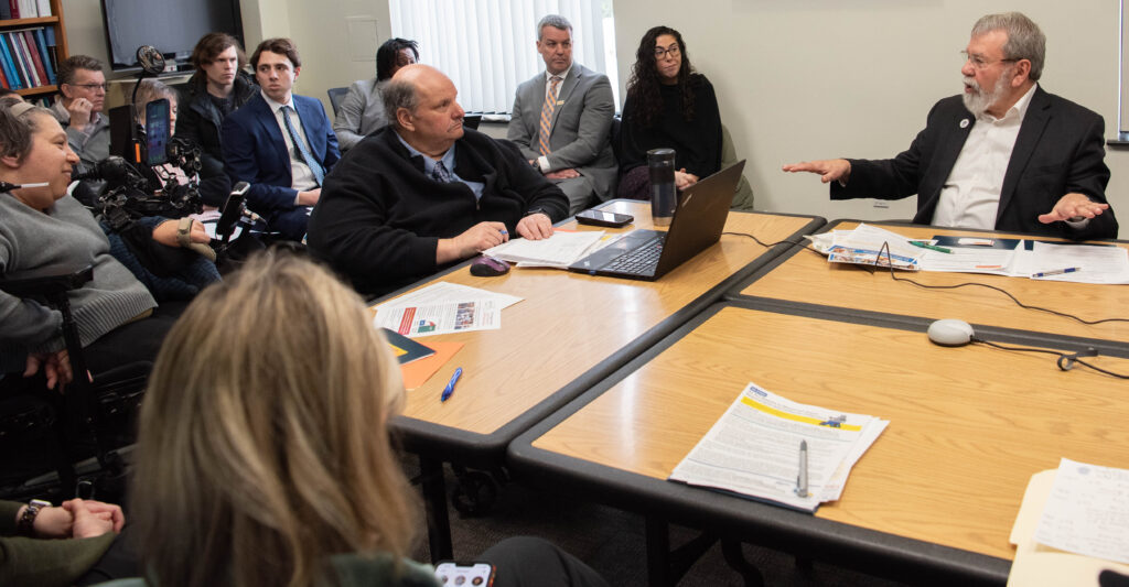 Rep Carmine Gentile speaks to room