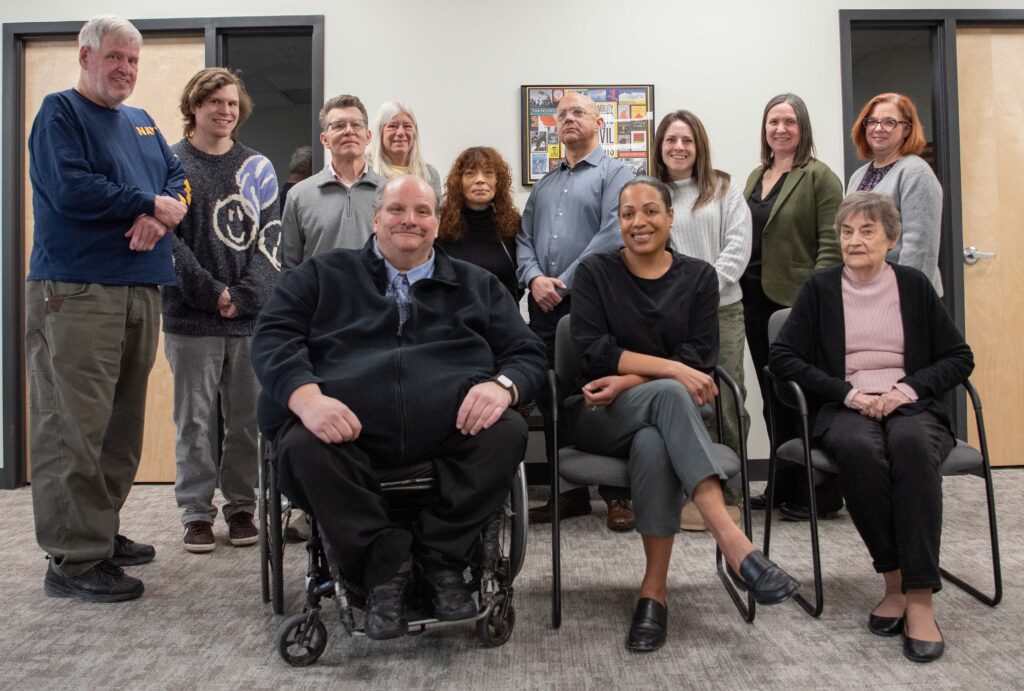 Staff photo of MWCIL, plus board member Joe Bellil