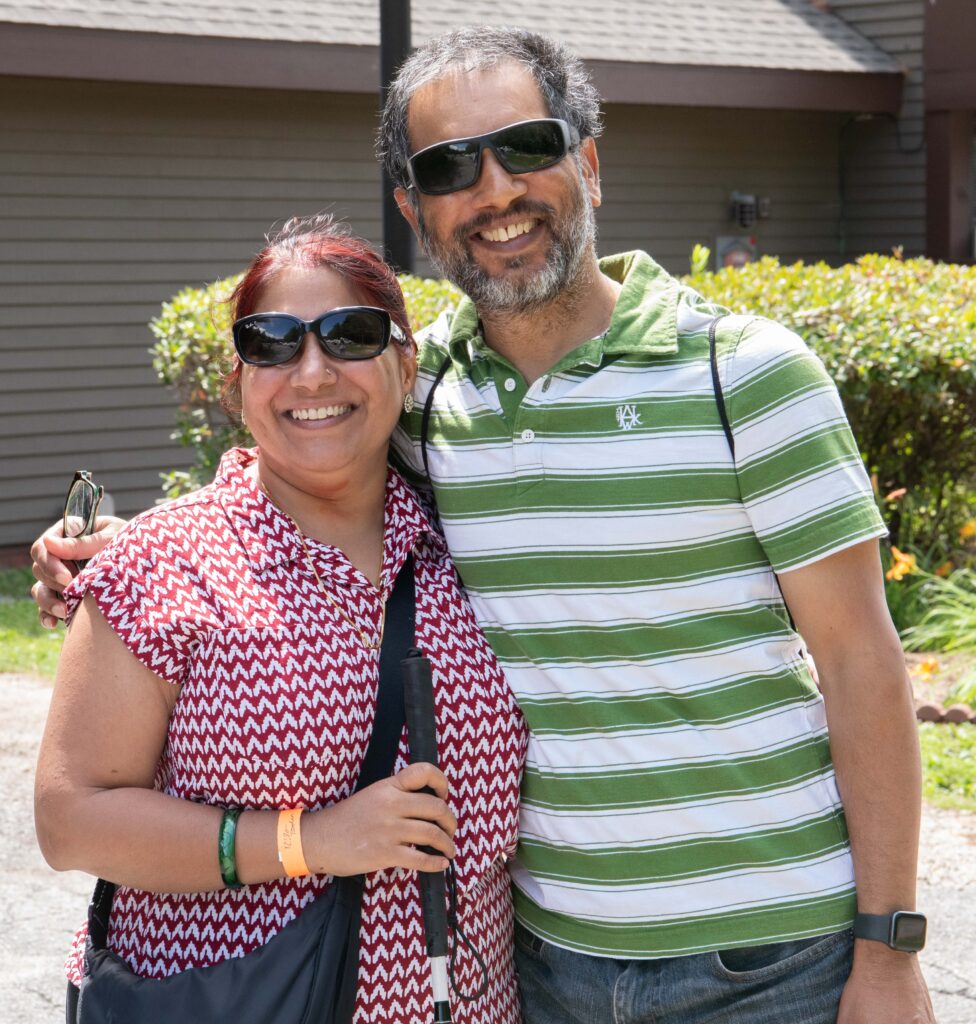 Two people smiling