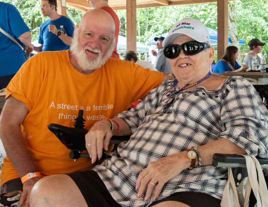 Two people smiling
